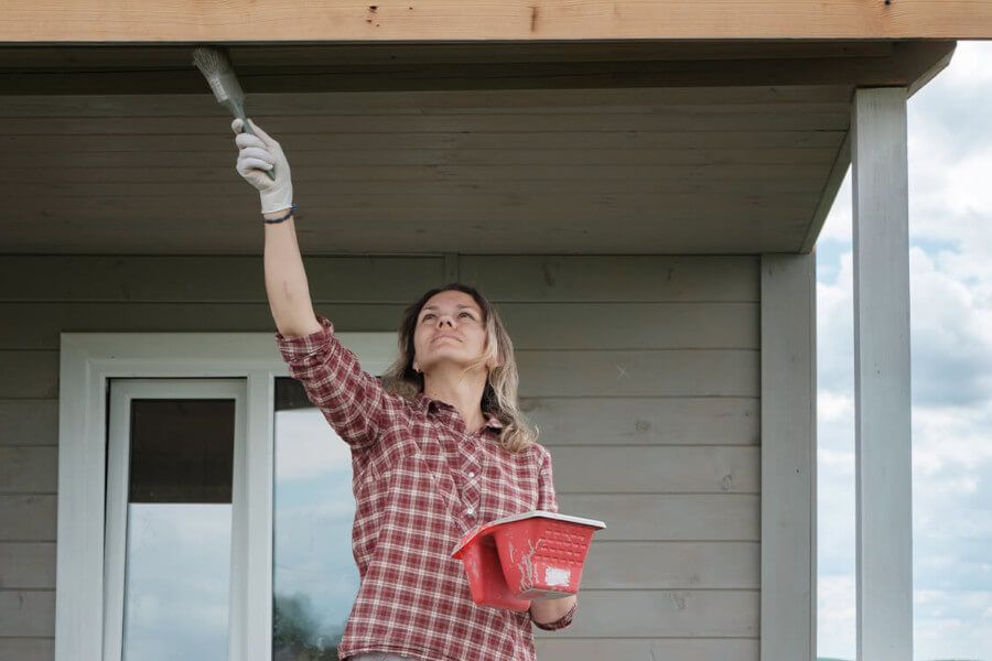 Wooden house treatment and painting